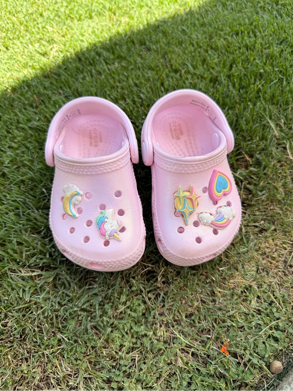 CROCS Kids Light Pink Clogs Size 5 with Rainbow, Unicorn, and Star Jibbitz